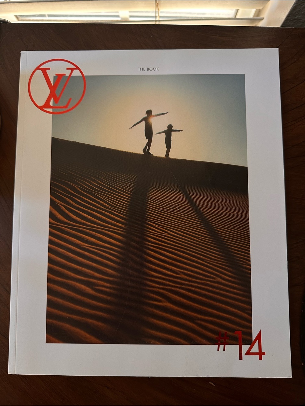 Louis Vuitton art book with white cover and red accents